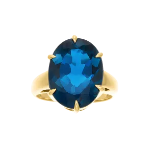 Oval Blue Topaz Cocktail Ring in 18k Yellow gold